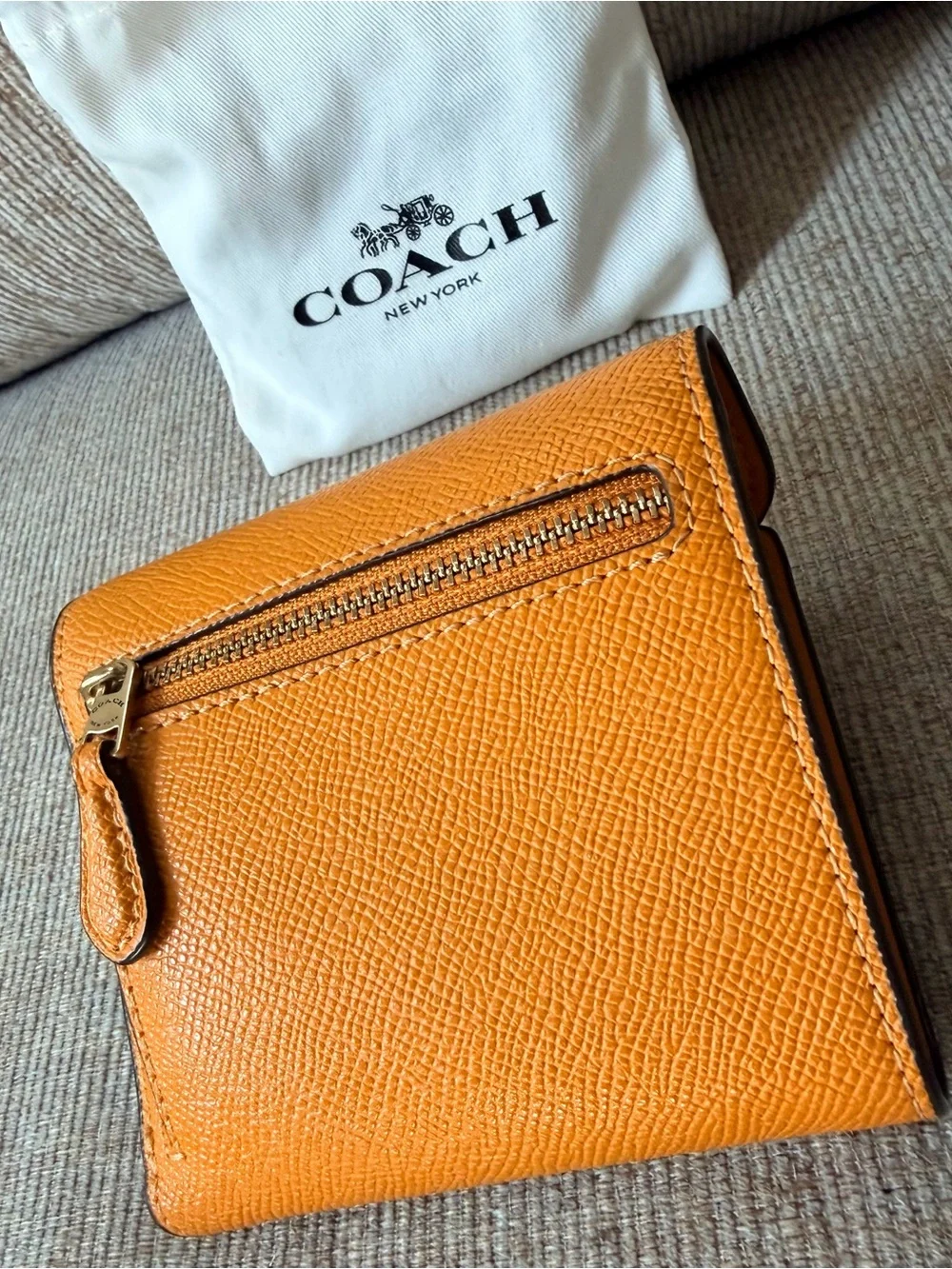 Coach Orange Leather Compact Wallet with Gold 'C' Hardware